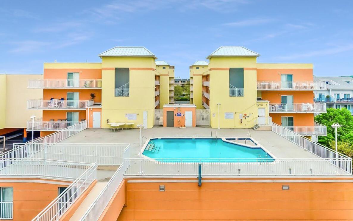 Sunset Condos Overlooking Pool Reference: Sunset Bay 418